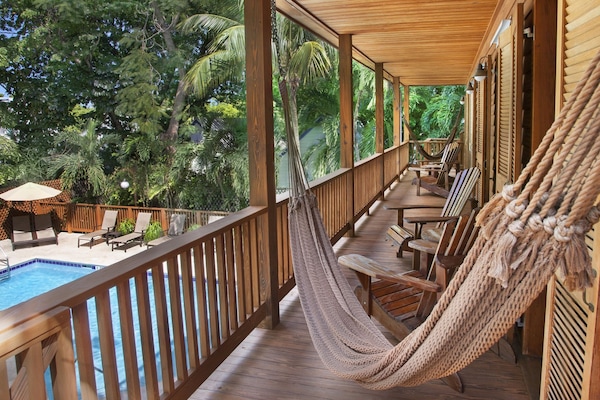 Cigar House King Suite w/ Poolside porch | Balcony view