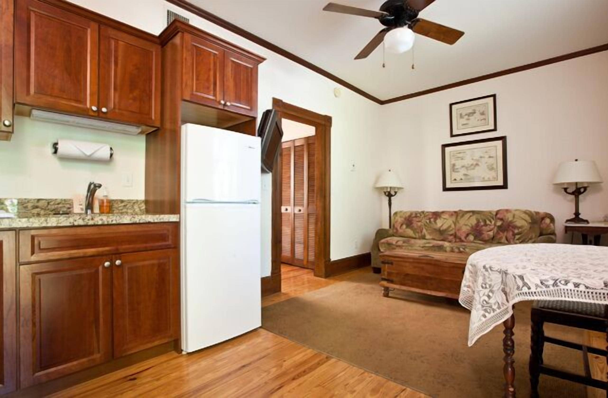 island city house queen suite | private kitchenette | full-sized fridge, microwave, stovetop, coffee/tea maker