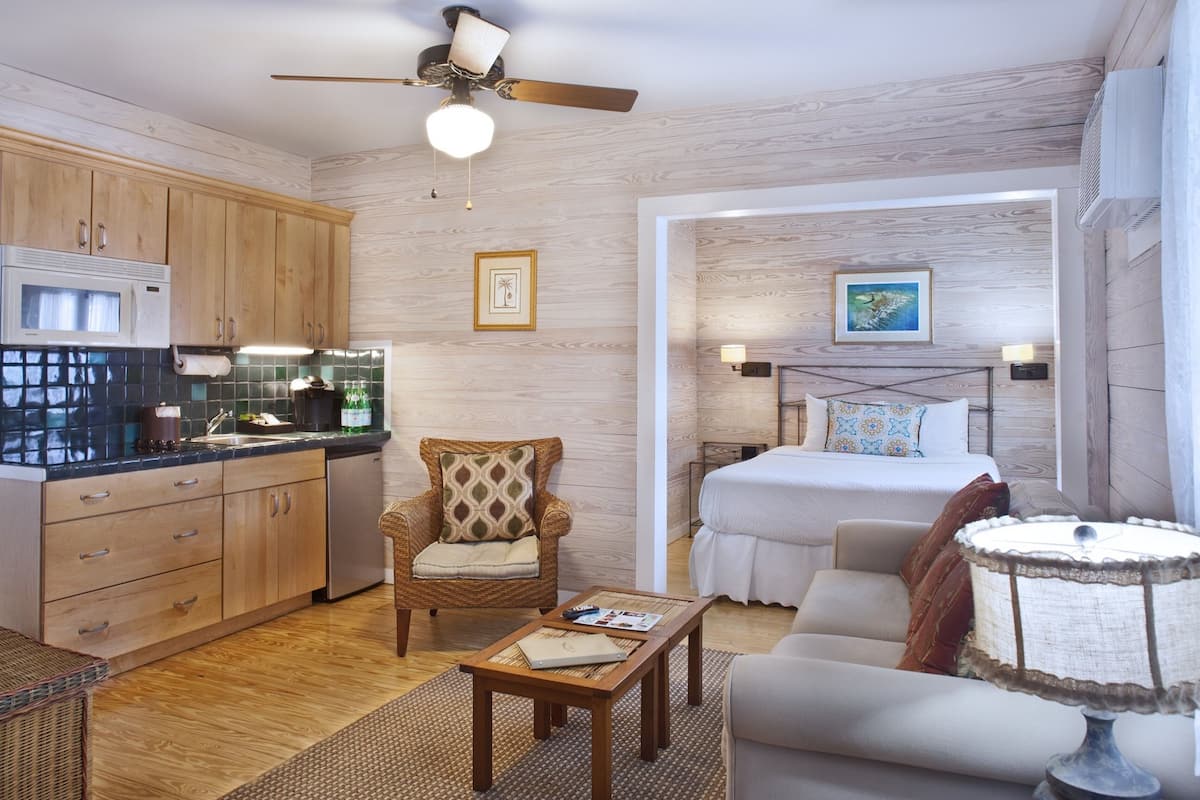 full-sized fridge, microwave, stovetop, coffee/tea maker