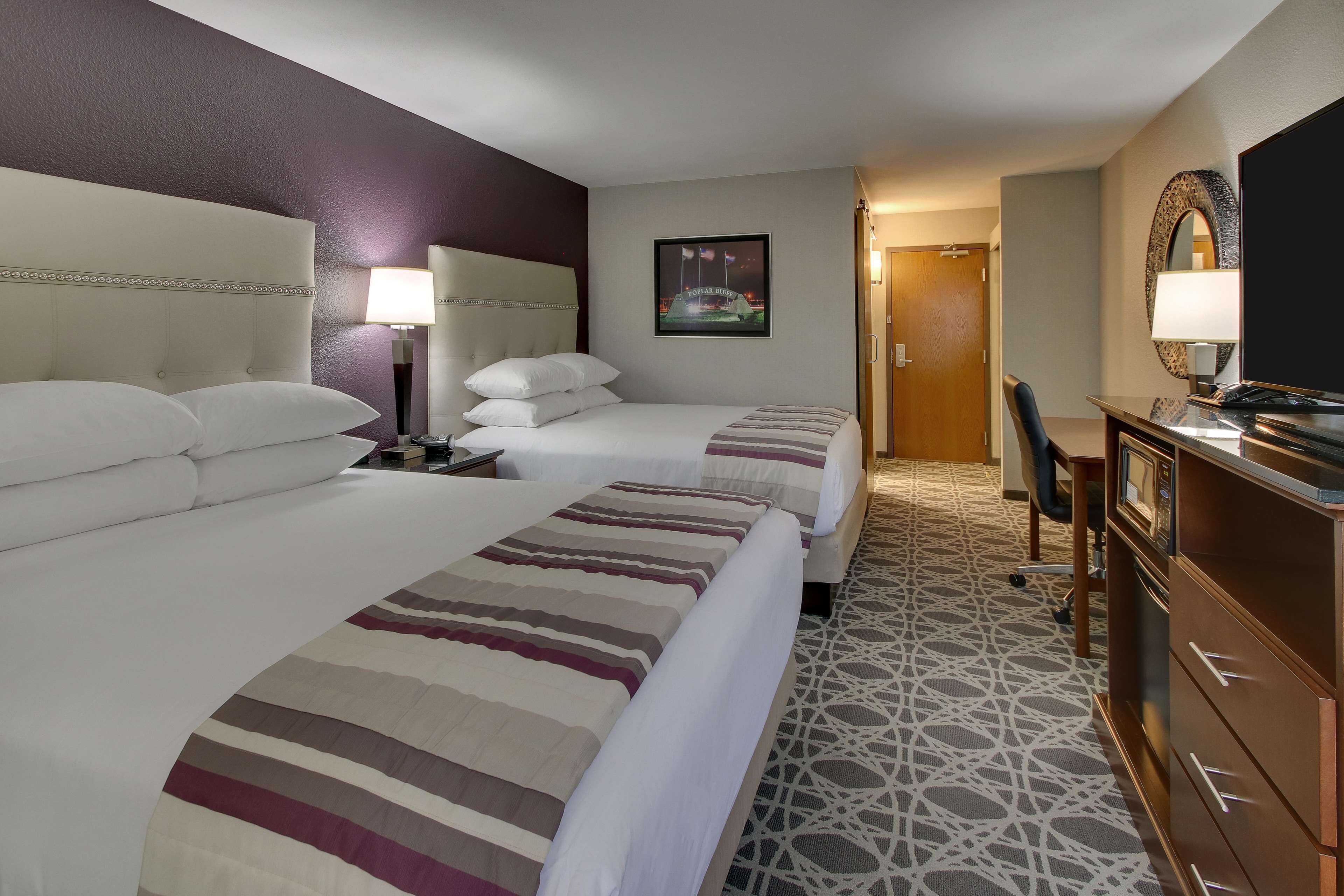 desk, blackout curtains, iron/ironing board, free cots/infant beds