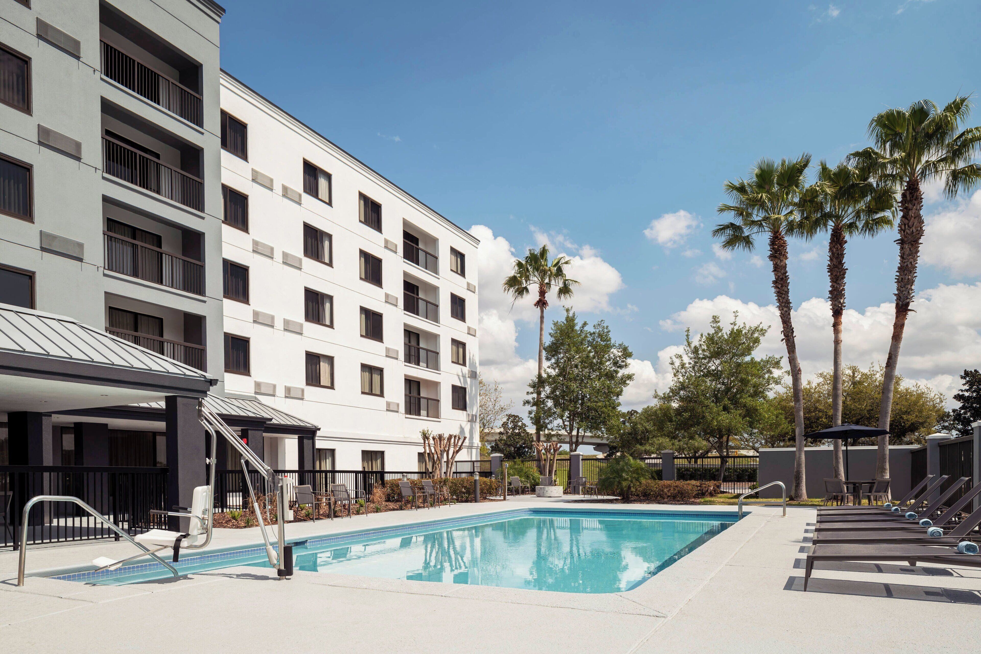 Outdoor pool, pool umbrellas, sun loungers