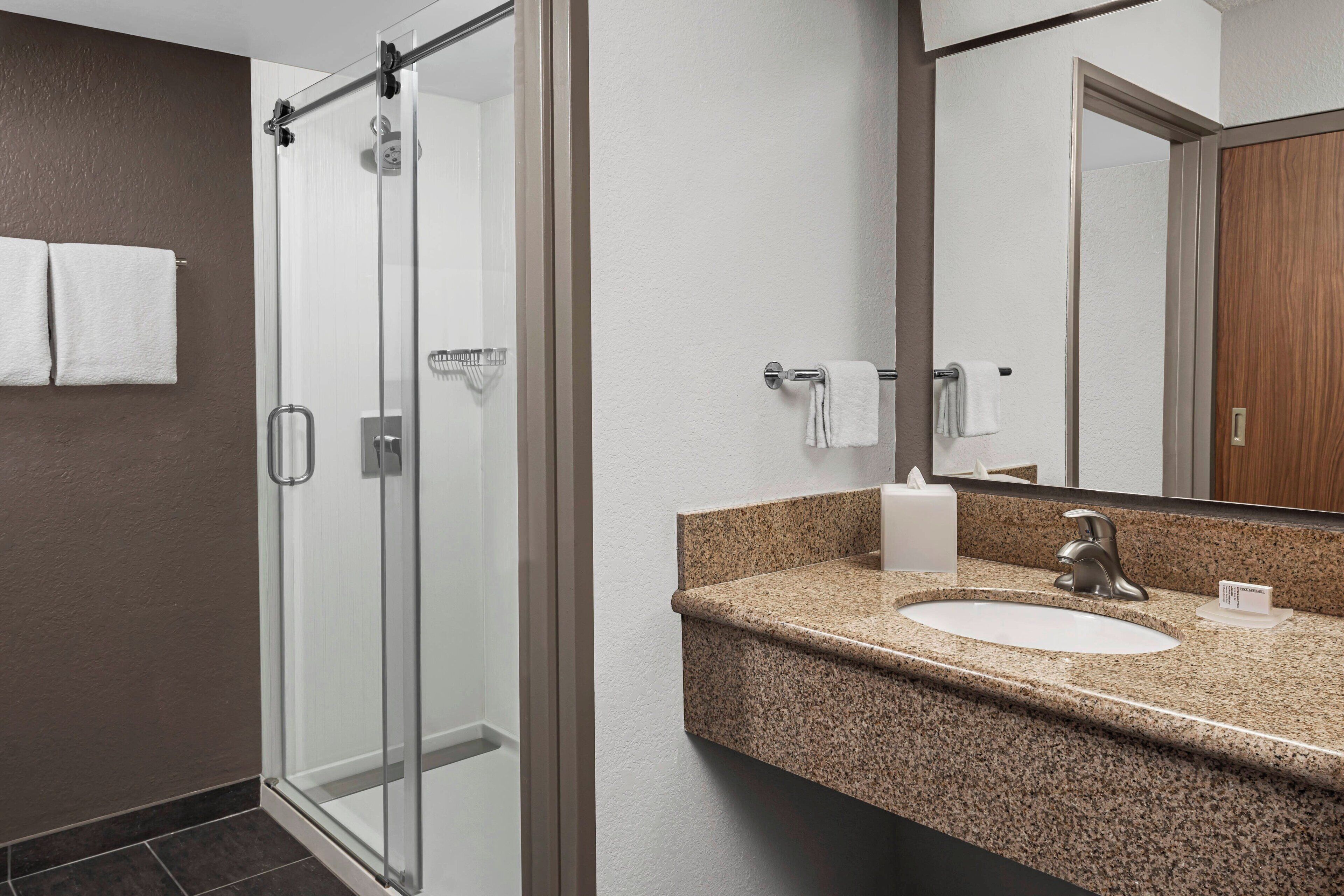 combined shower/bathtub, free toiletries, hair dryer, towels