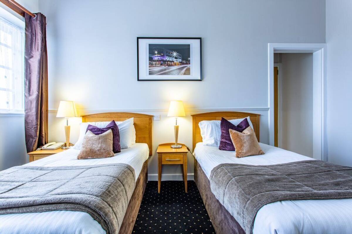 WiFi (free), alarm clocks, bed sheets