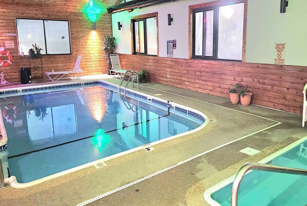 Indoor pool, open 9:00 AM to 10:00 PM, pool loungers