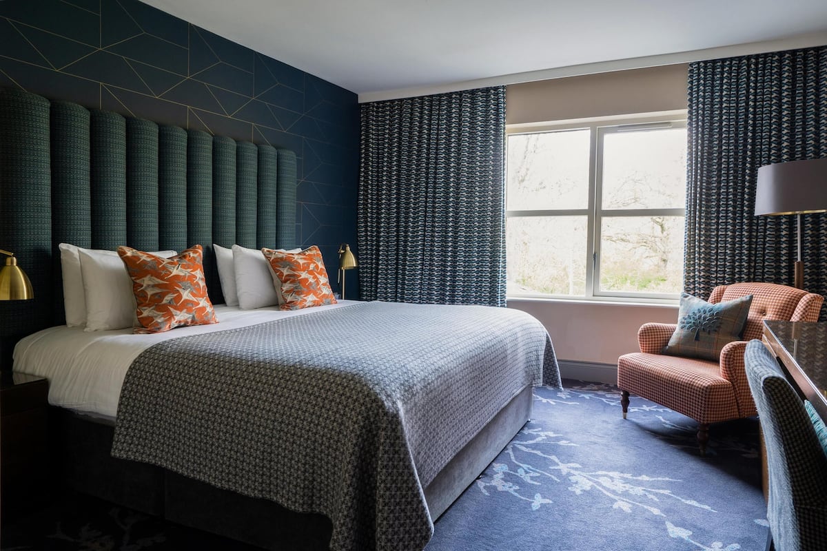 premium bedding, desk, blackout curtains, soundproofing