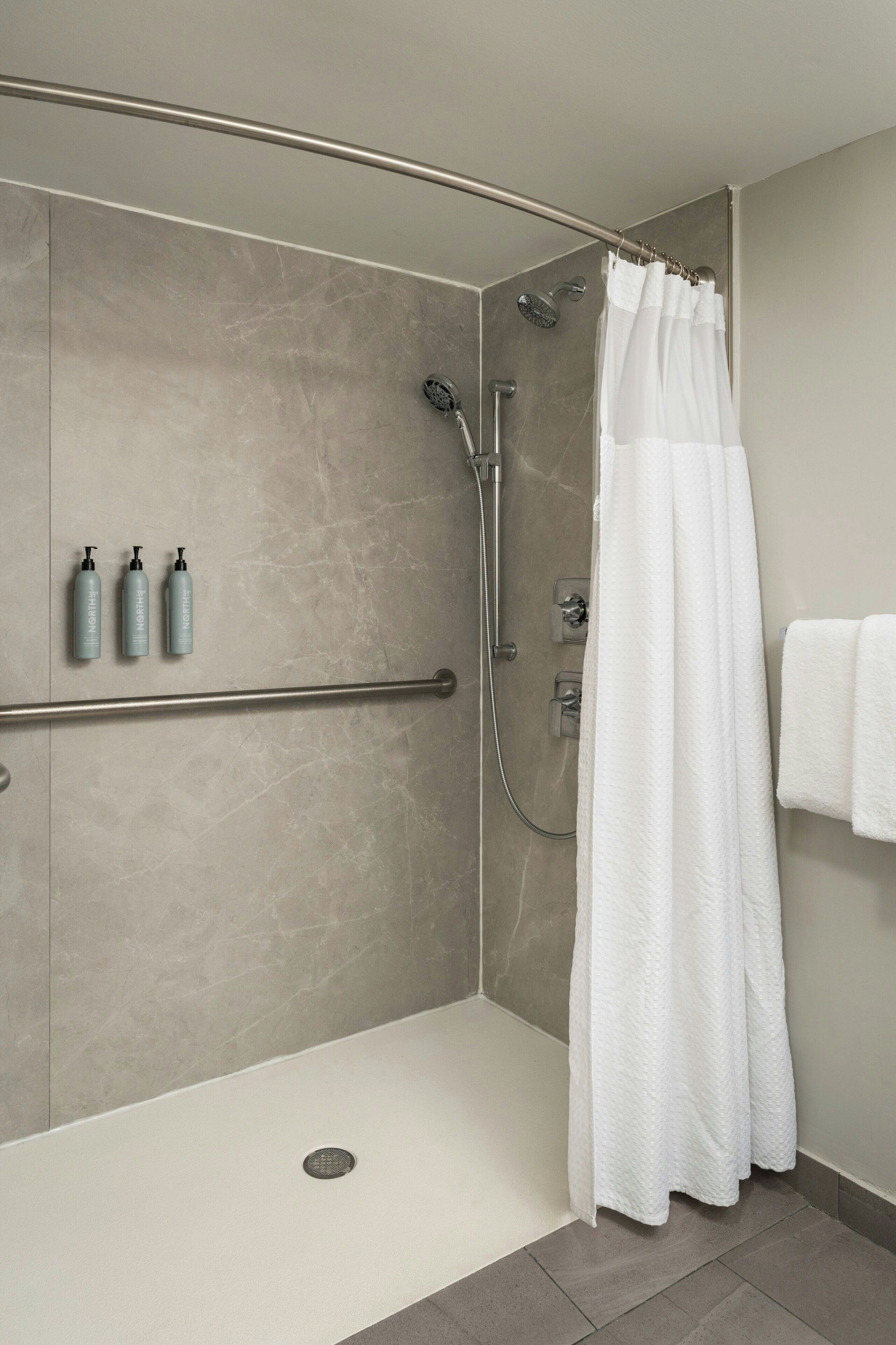 room, 1 king bed with sofa bed | bathroom | free toiletries, hair dryer, towels