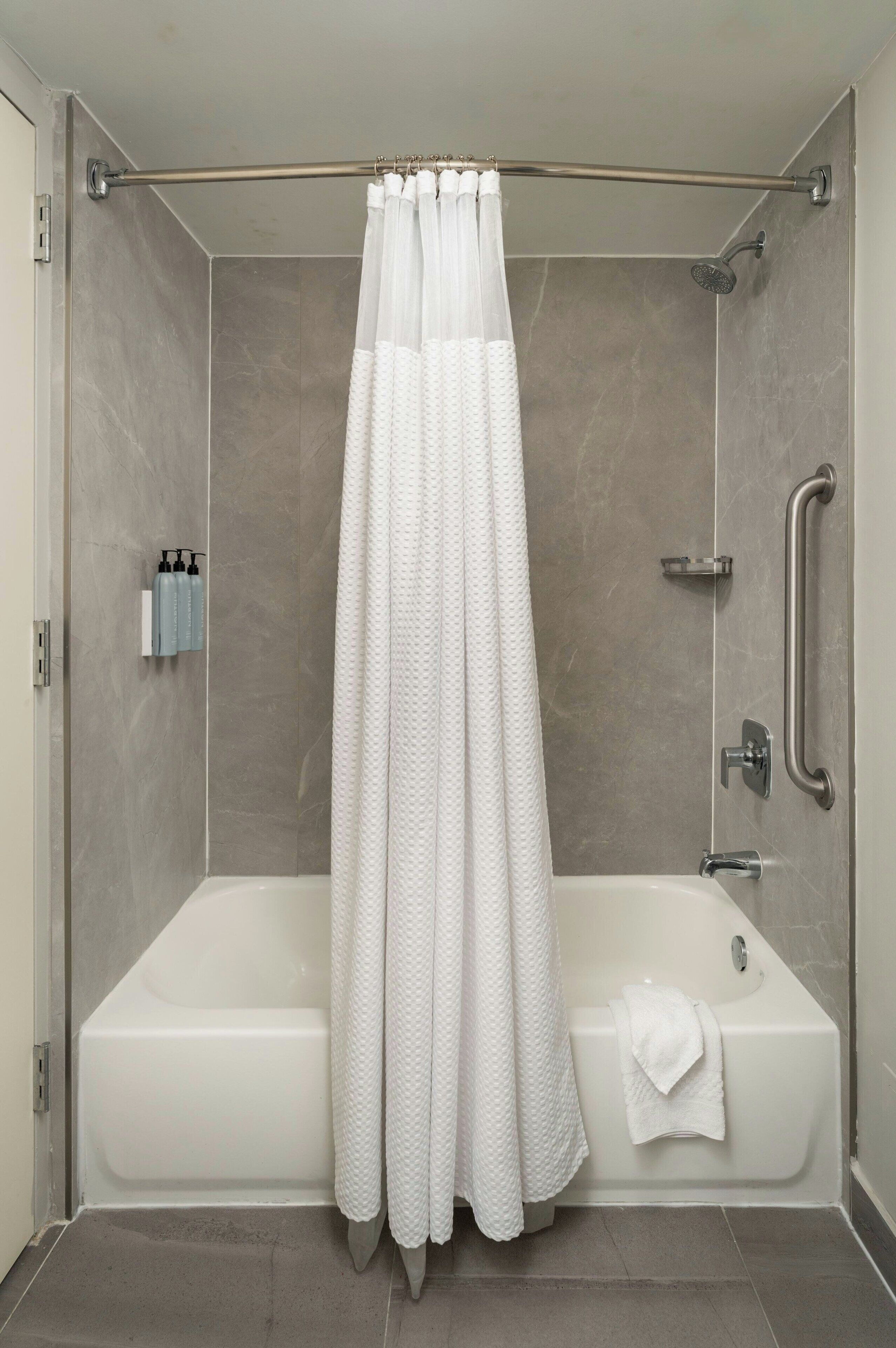 room, 2 queen beds | bathroom | free toiletries, hair dryer, towels