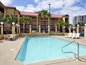Seasonal outdoor pool, pool loungers