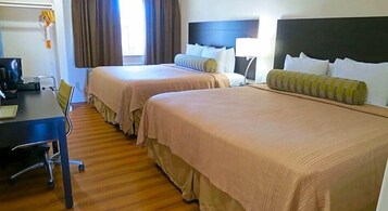 Colchones con pillow-top, escritorio y espacio para trabajar con laptop 