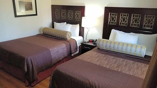 Pillow-top beds, desk, laptop workspace, blackout curtains