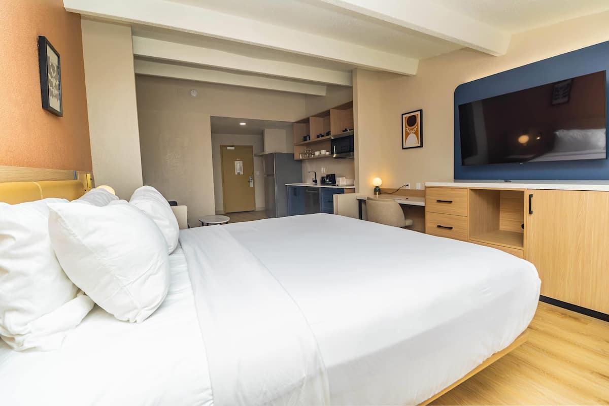 Studio Suite, 1 King Bed, Non Smoking, Kitchen | In-room safe, desk, blackout drapes, iron/ironing board