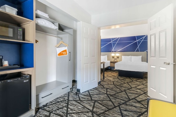 Suite, Multiple Beds, Non Smoking | Individually decorated, individually furnished, desk, blackout curtains
