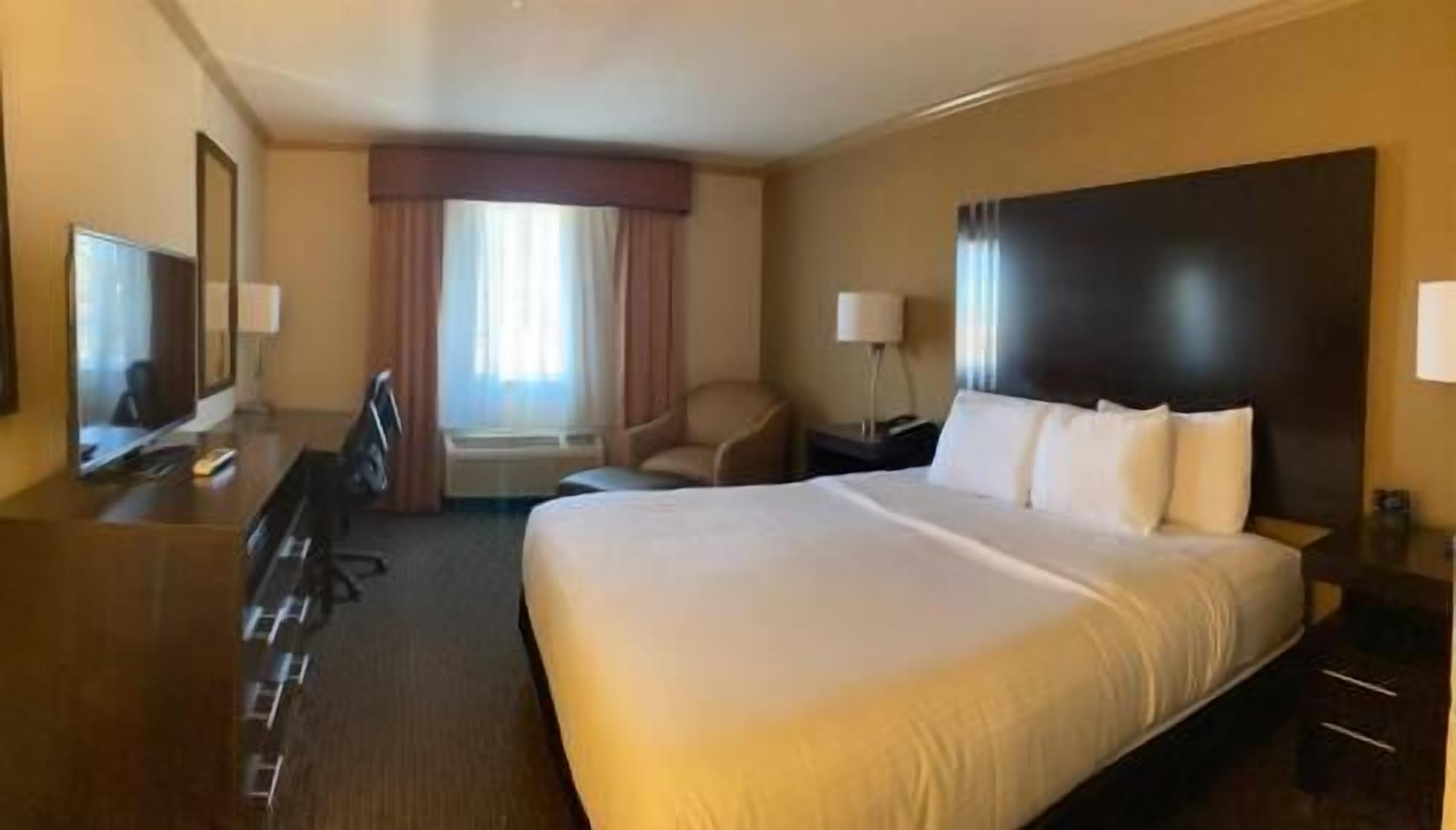 Premium bedding, pillow-top beds, desk, iron/ironing board