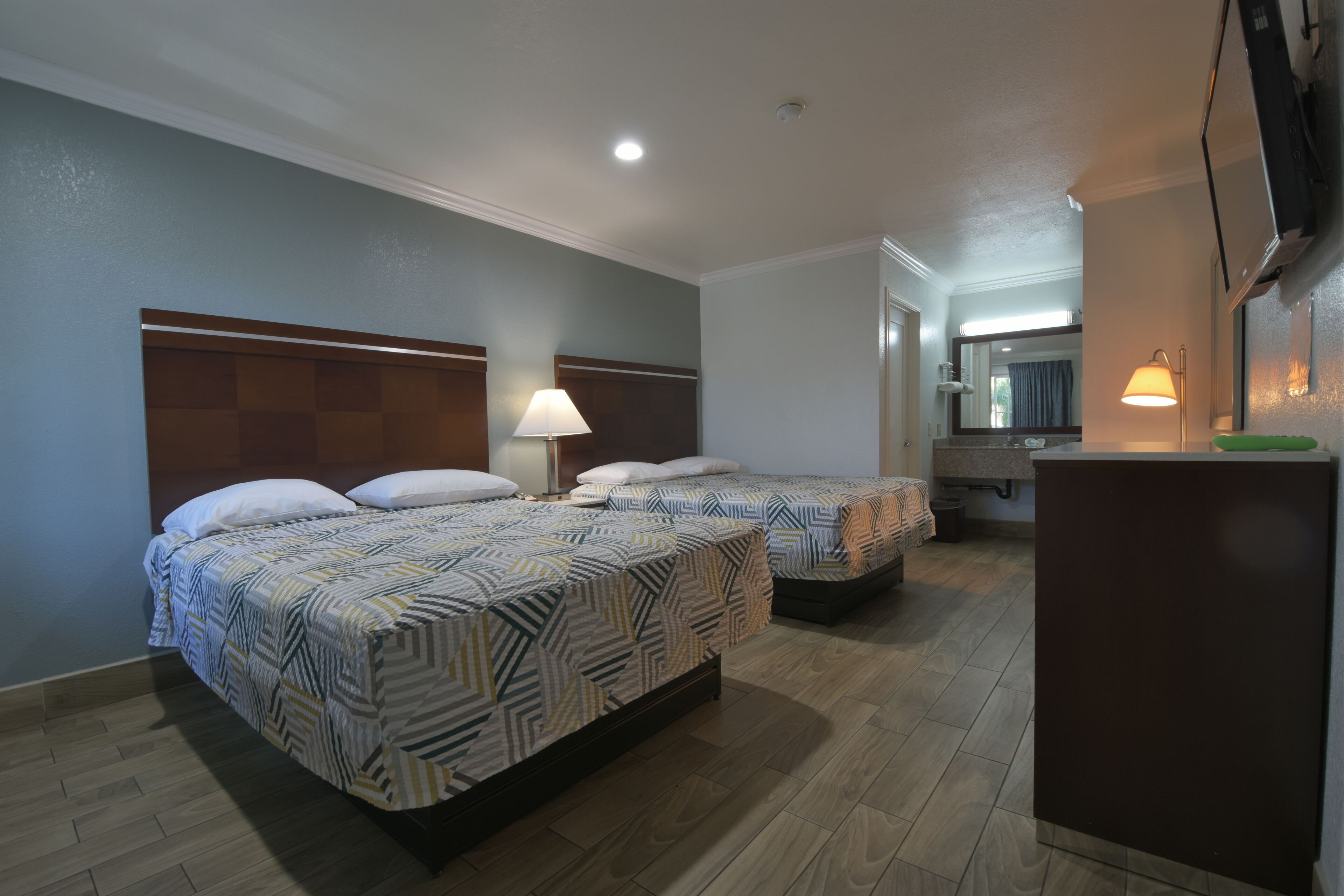 Standard Room, 2 Queen Beds, Non Smoking | Minibar, in-room safe, desk, iron/ironing board