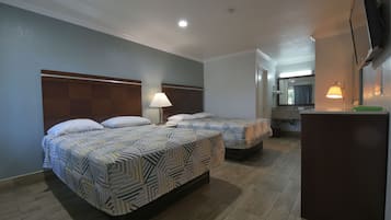 Standard Room, 2 Queen Beds, Non Smoking | Minibar, in-room safe, desk, iron/ironing board