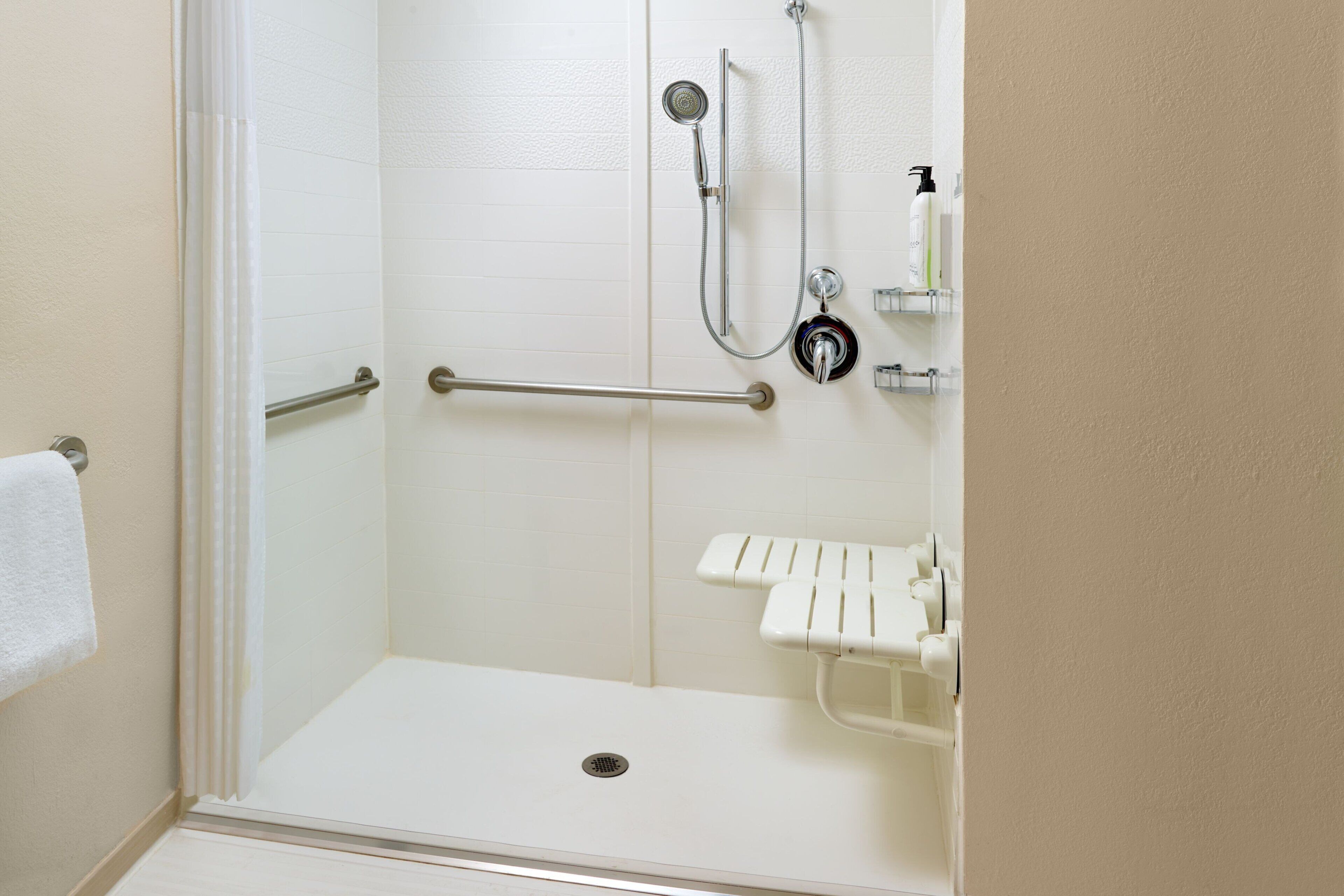 combined shower/bathtub, free toiletries, hair dryer, towels