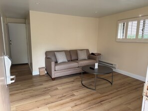 Standard Cottage, 2 Bedrooms | Living area | 32-inch flat-screen TV with cable channels, TV - Carmel Resort Inn (Carmel)