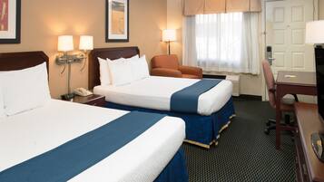 Desk, laptop workspace, blackout drapes, iron/ironing board