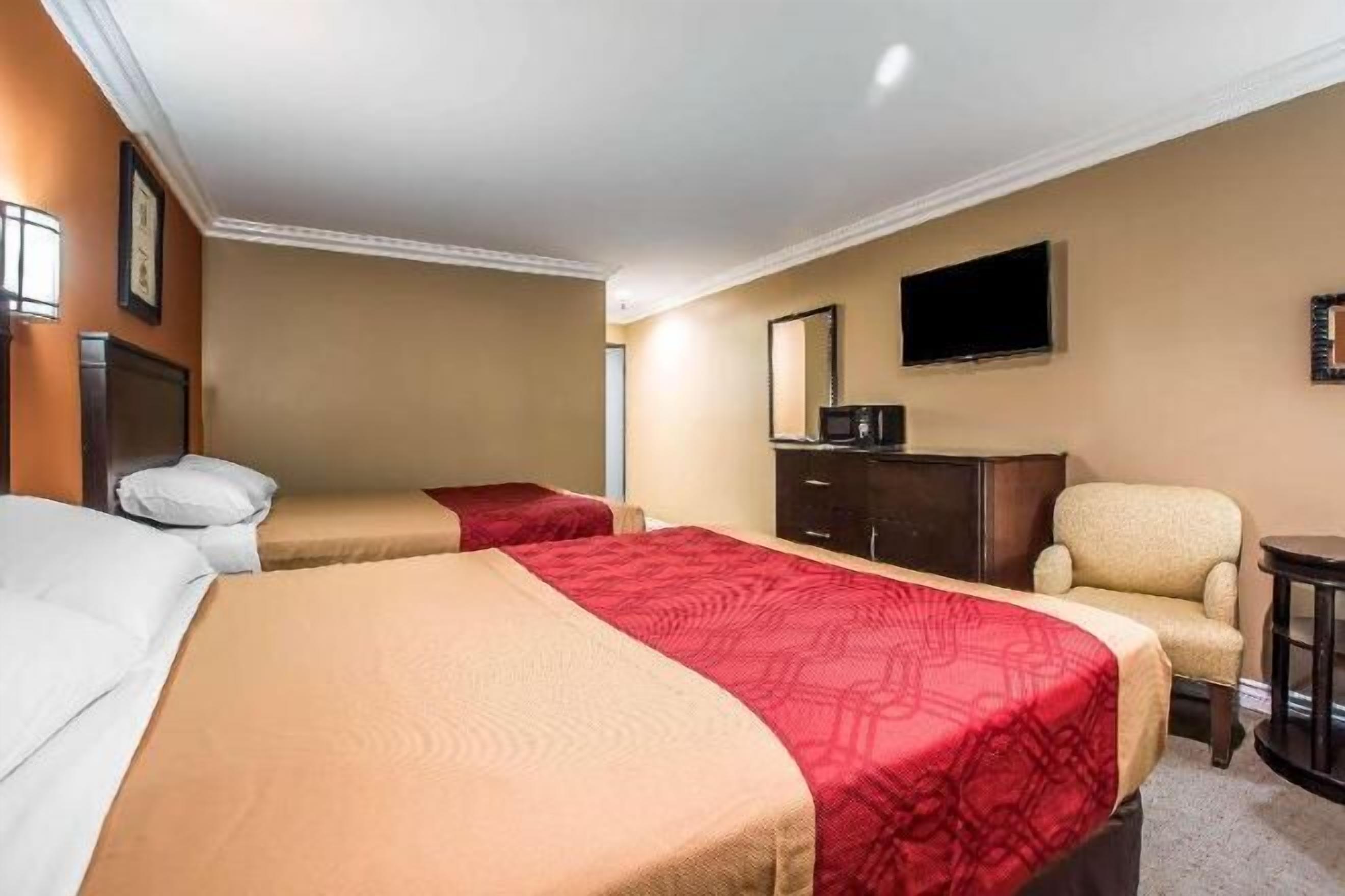 Blackout drapes, iron/ironing board, rollaway beds, free WiFi