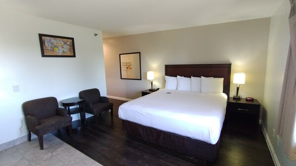 Cortinas blackout, tabla de planchar con plancha y camas extra 