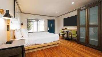 Premium bedding, pillow-top beds, desk, blackout curtains