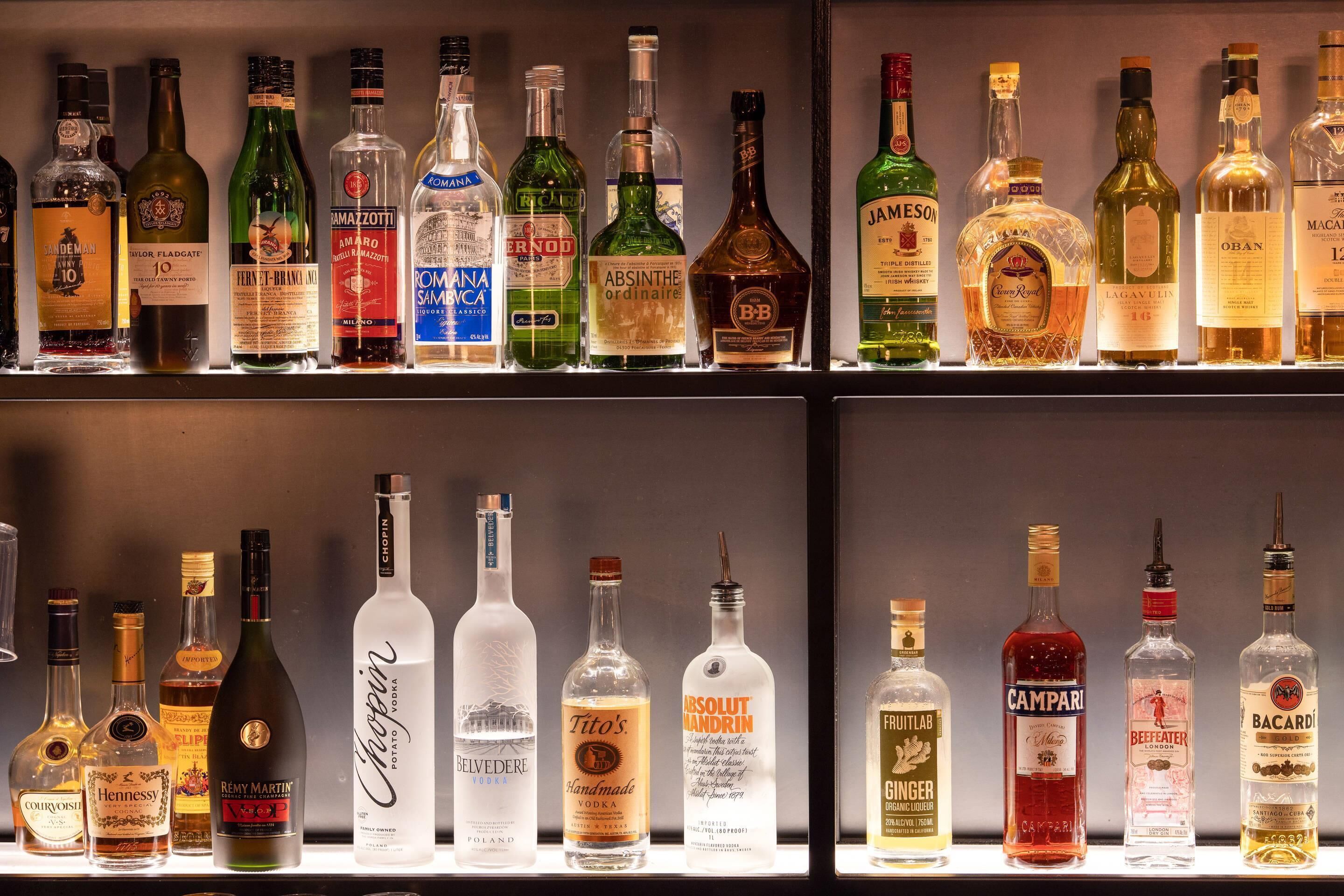 Shelves of various liquor bottles.