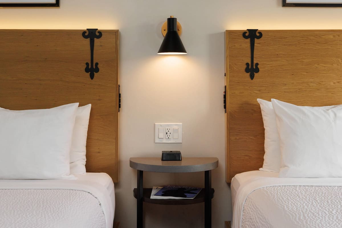 Premium bedding, pillow-top beds, desk, blackout curtains