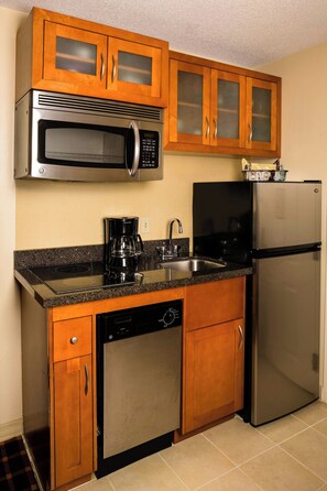 Fridge, microwave, stovetop, coffee/tea maker