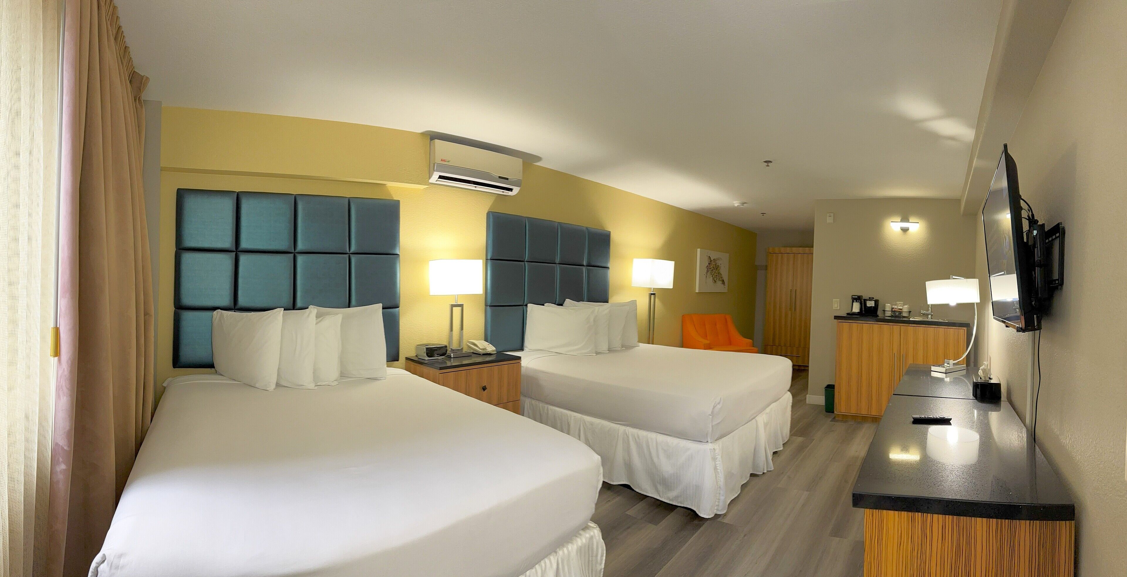 Deluxe Room, 2 Queen Beds | Hypo-allergenic bedding, pillowtop beds, in-room safe, desk