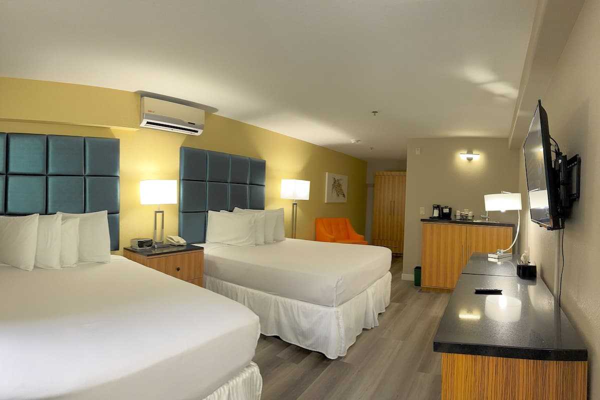 Deluxe Room, 2 Queen Beds | Hypo-allergenic bedding, pillowtop beds, in-room safe, desk