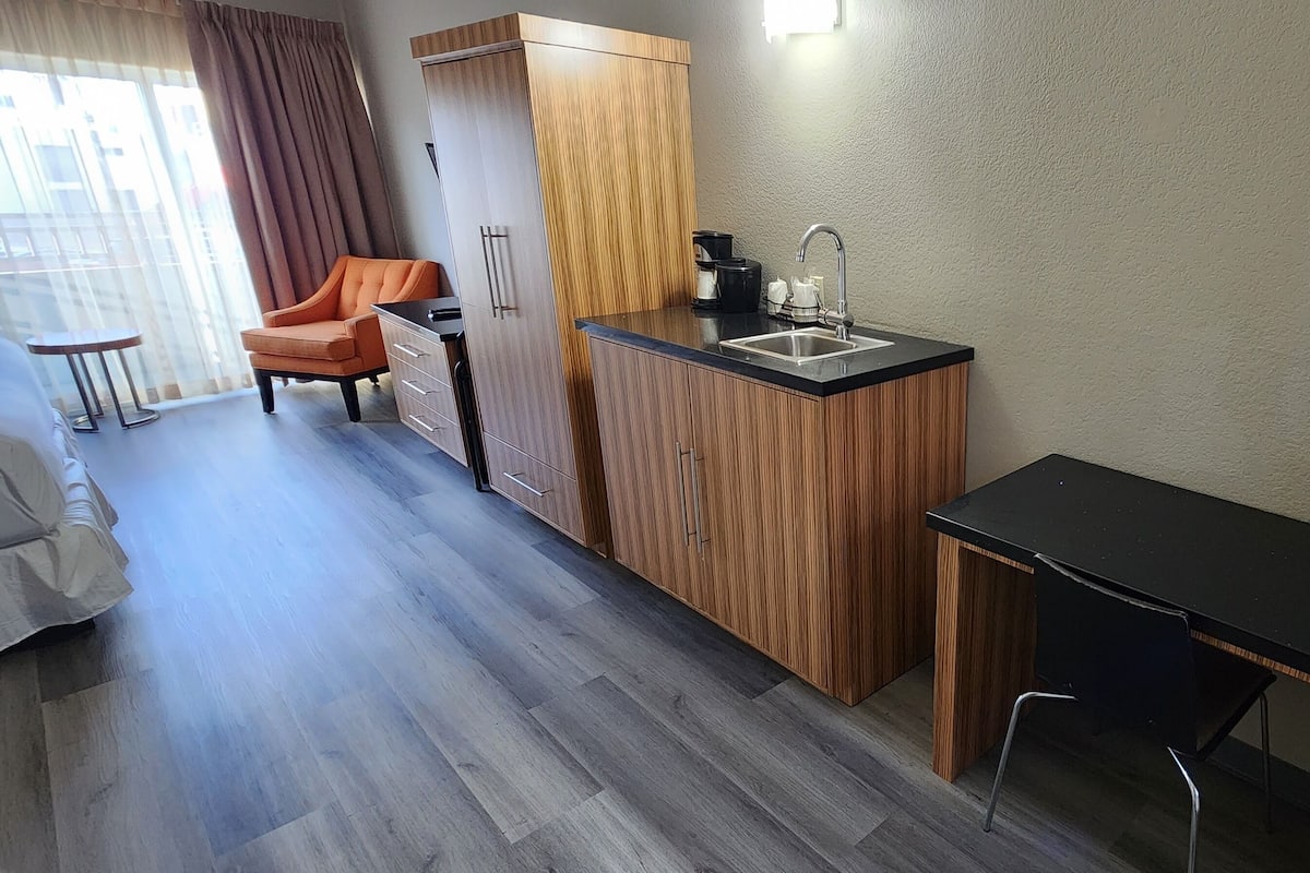 Hypo-allergenic bedding, pillow-top beds, in-room safe, desk