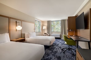 Premium bedding, down comforters, pillowtop beds, in-room safe