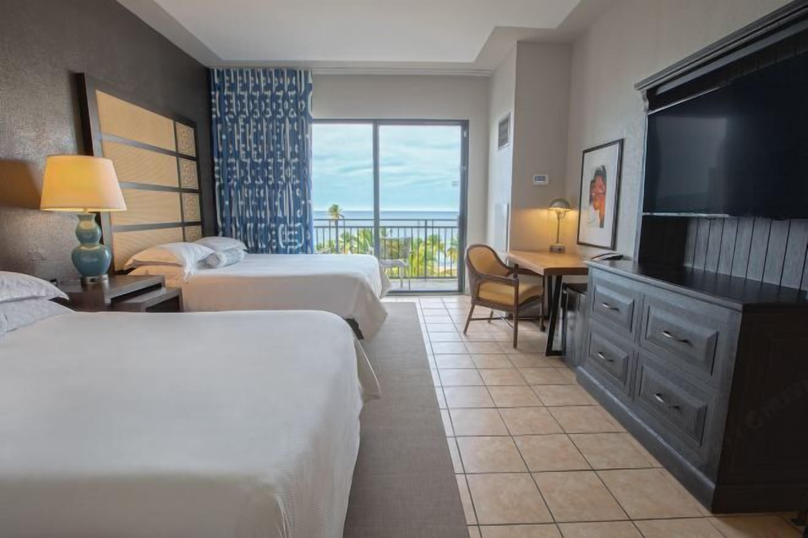 Premium bedding, down duvets, pillow-top beds, in-room safe