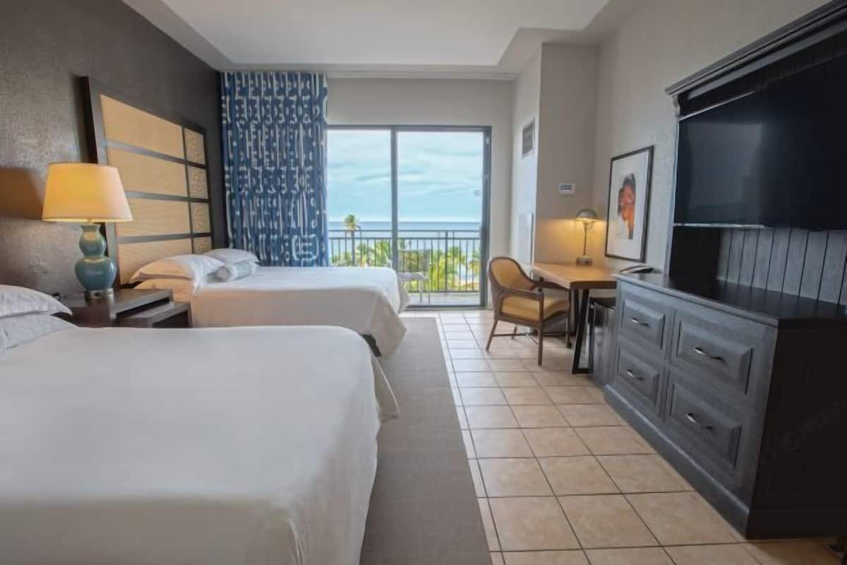 Premium bedding, down comforters, pillowtop beds, in-room safe