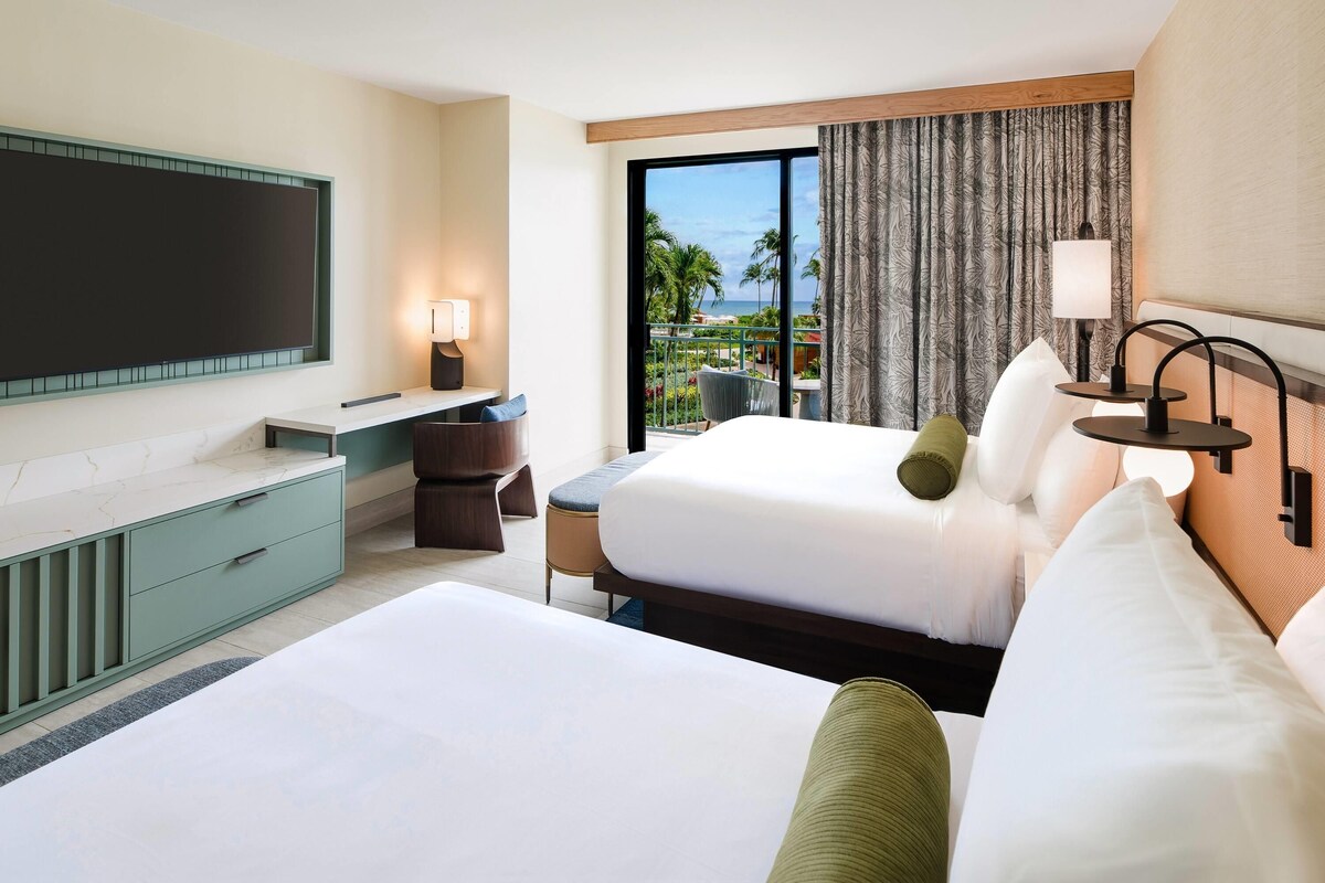 Premium bedding, down duvets, pillow-top beds, in-room safe