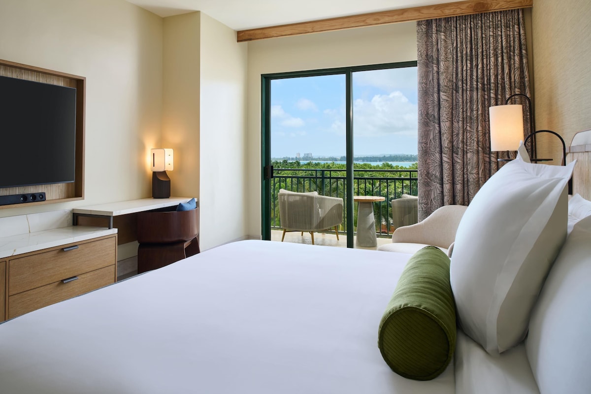 Premium bedding, down comforters, pillowtop beds, in-room safe