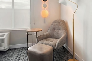 Desk, laptop workspace, blackout drapes, iron/ironing board