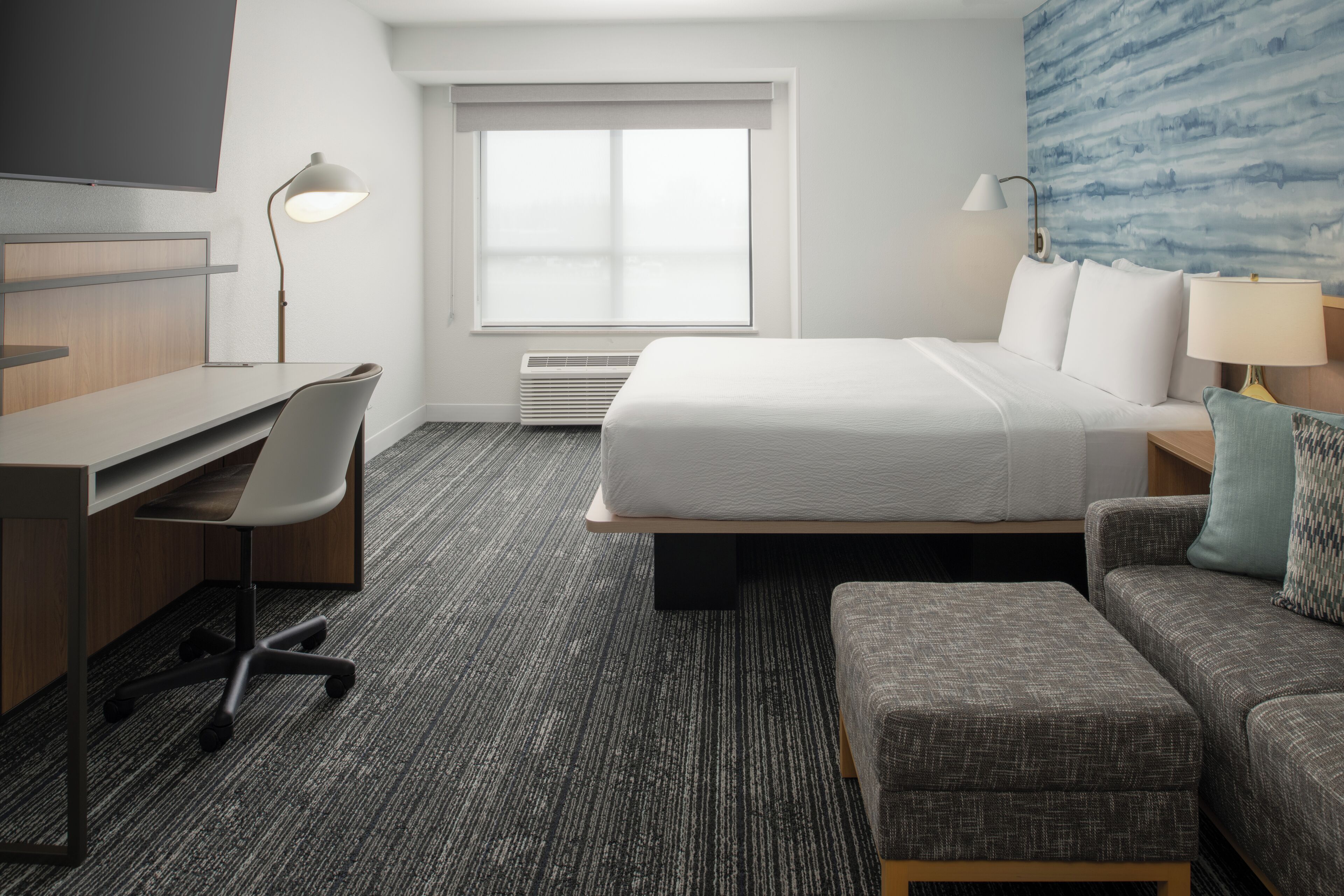 Desk, laptop workspace, blackout drapes, iron/ironing board