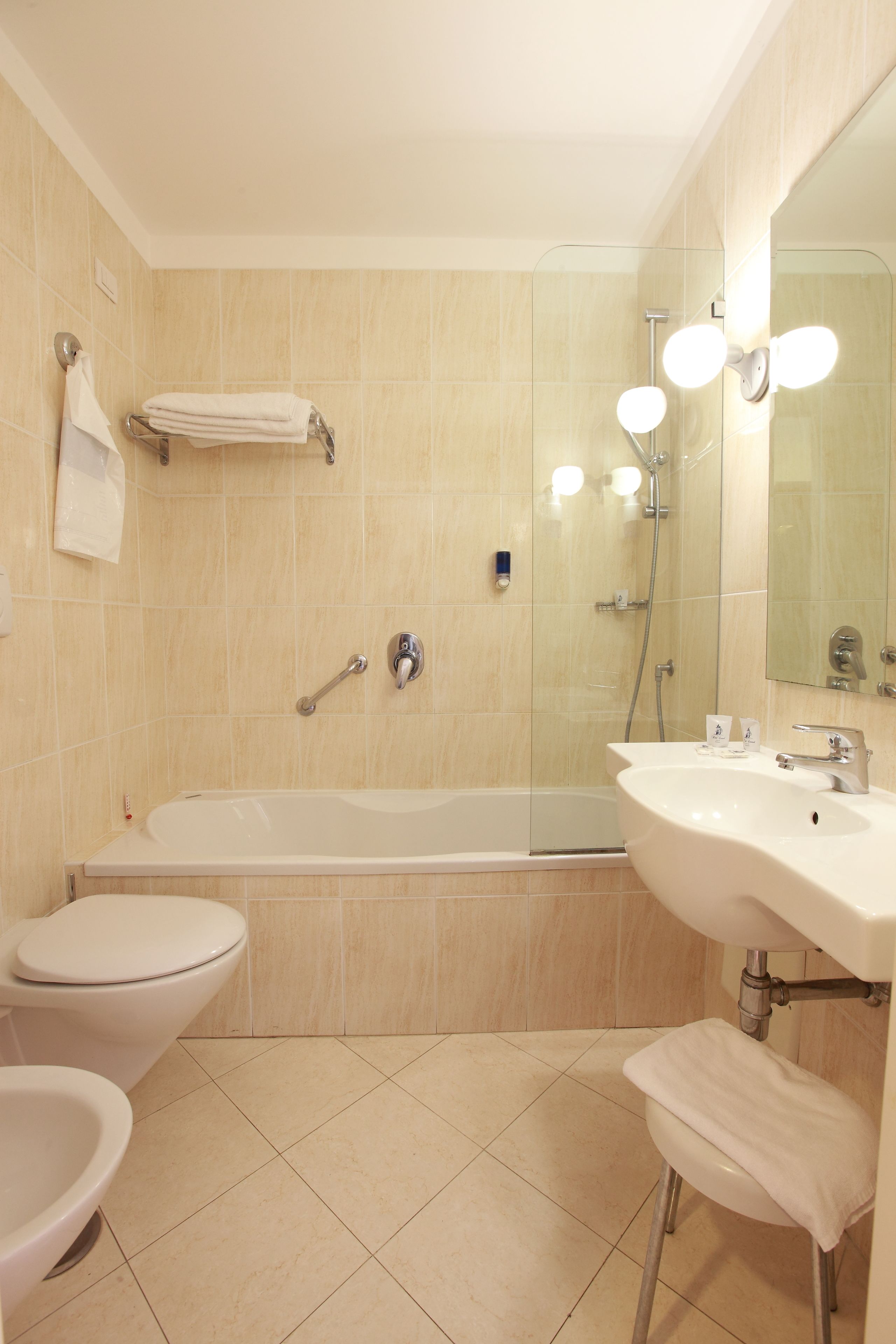 free toiletries, hair dryer, bidet, towels