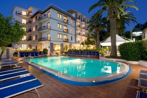 Seasonal outdoor pool, pool umbrellas, pool loungers