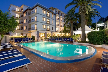 Seasonal outdoor pool, pool umbrellas, pool loungers