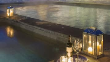 Outdoor pool, a heated pool, pool umbrellas, sun loungers