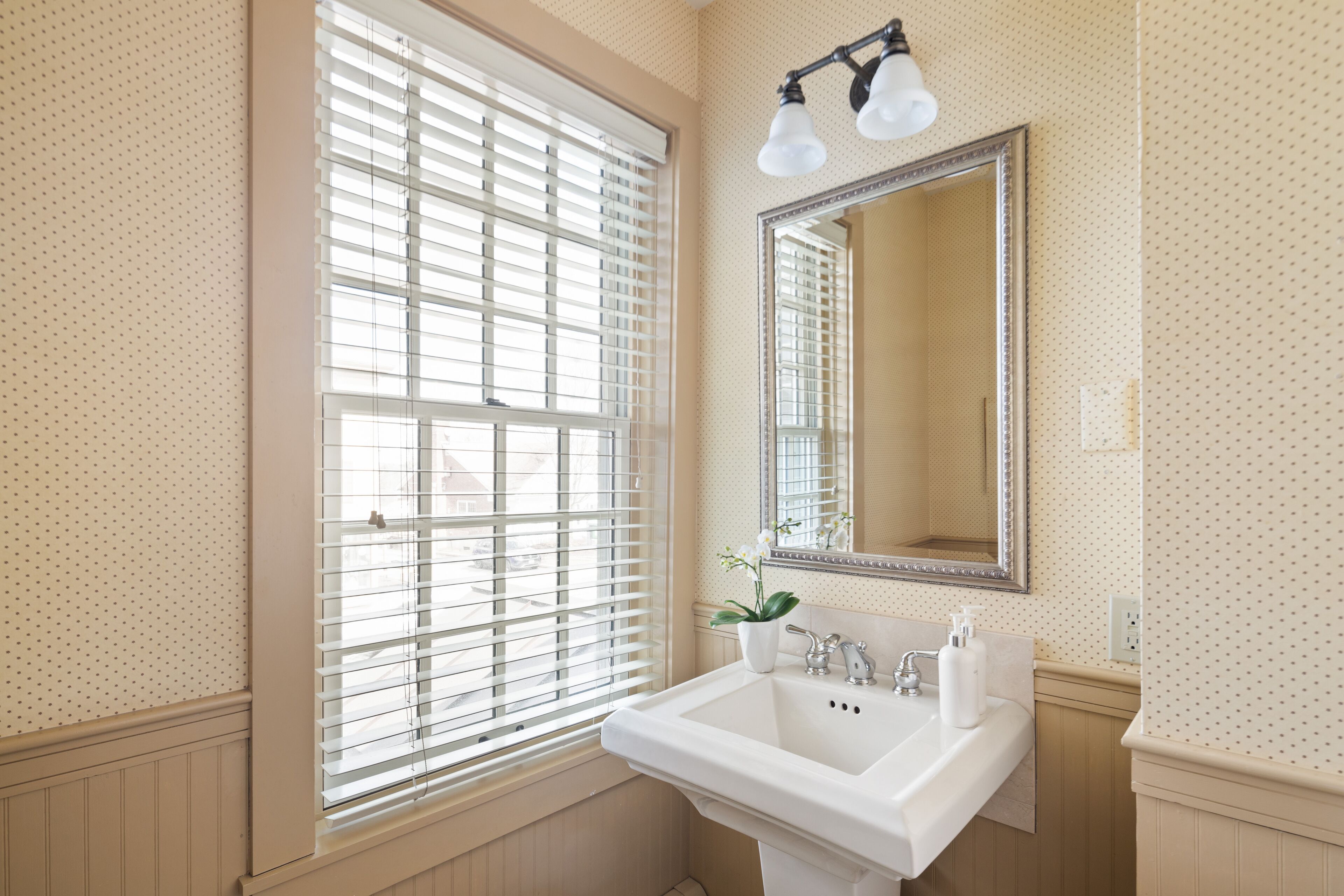 classic room, 2 queen beds | bathroom | designer toiletries, hair dryer, towels