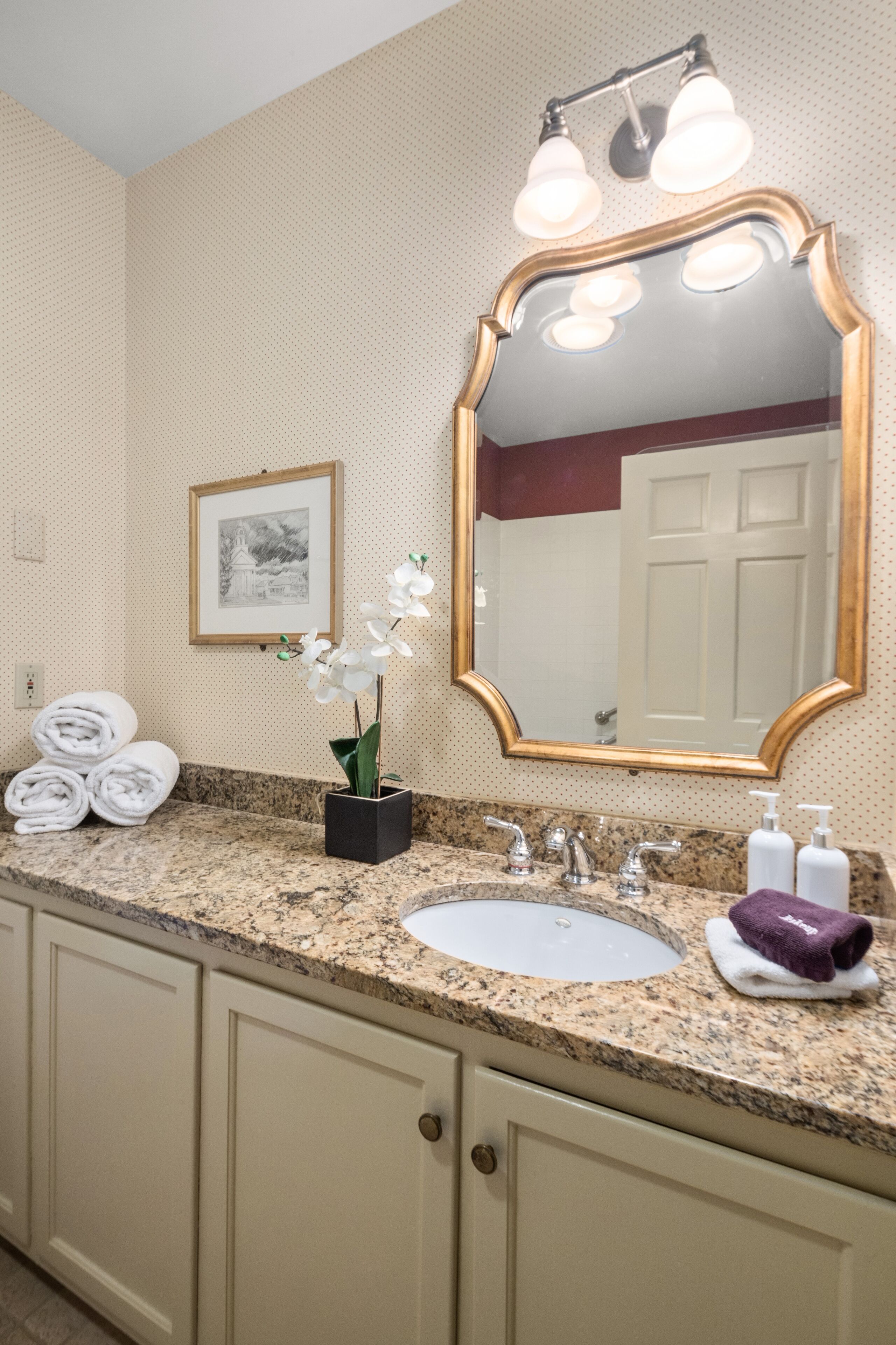 classic apartment | bathroom | designer toiletries, hair dryer, towels