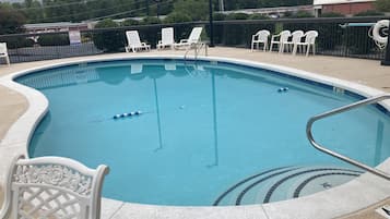 Seasonal outdoor pool, open 9 AM to 9 PM, pool loungers