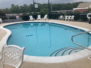 Seasonal outdoor pool, open 9 AM to 9 PM, pool loungers