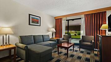 Suite, 1 King Bed, Non Smoking, Refrigerator & Microwave (Shower Only) | Desk, laptop workspace, iron/ironing board, rollaway beds