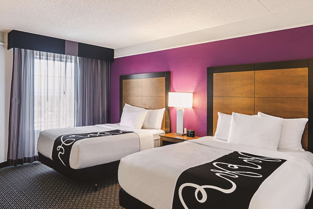 premium bedding, desk, blackout curtains, iron/ironing board