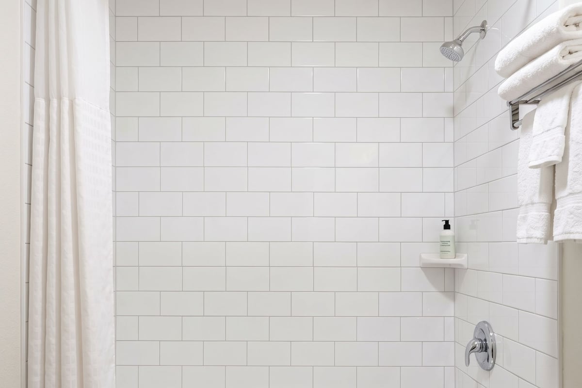 Standard Room, 2 Queen Beds, Non Smoking | Bathroom | Bathtub, hair dryer, towels
