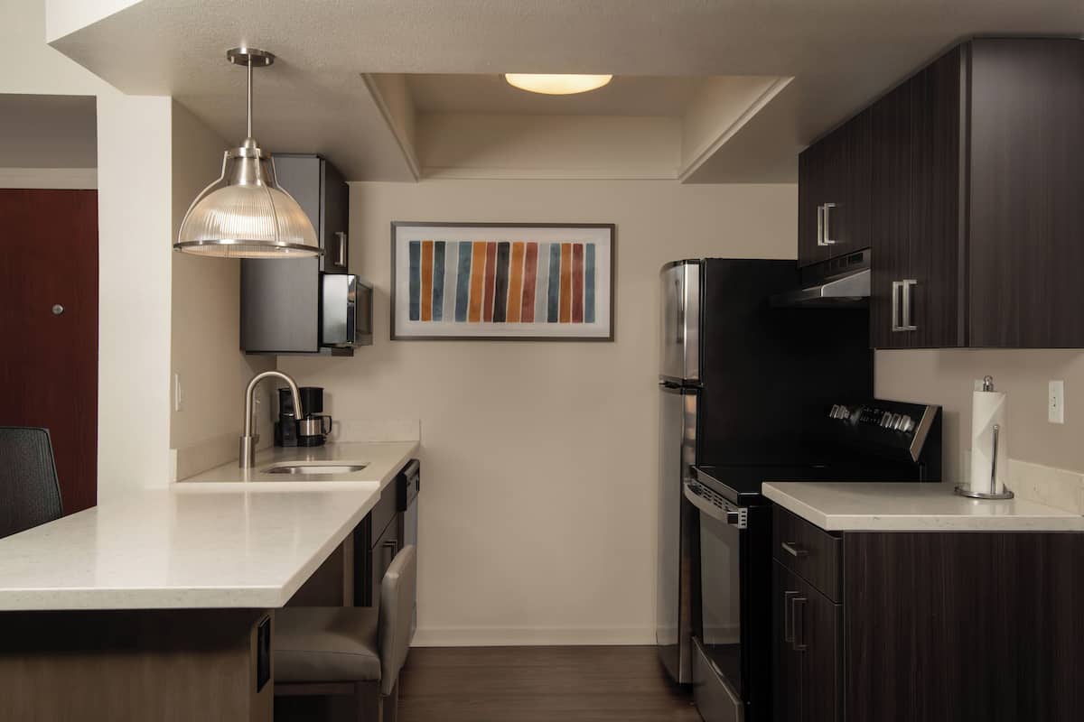 full-sized fridge, microwave, oven, stovetop